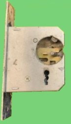 THIS IS A DRILLED OUT LOCK WHICH WAS LEFT IN THE DOOR, MANY COWBOYS OUT THERE, PLEASE WATCH OUT.